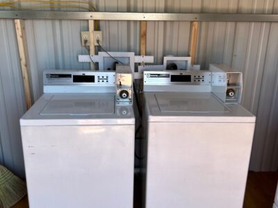 Riverbed RV Park laundry facility showing a washer and dryer